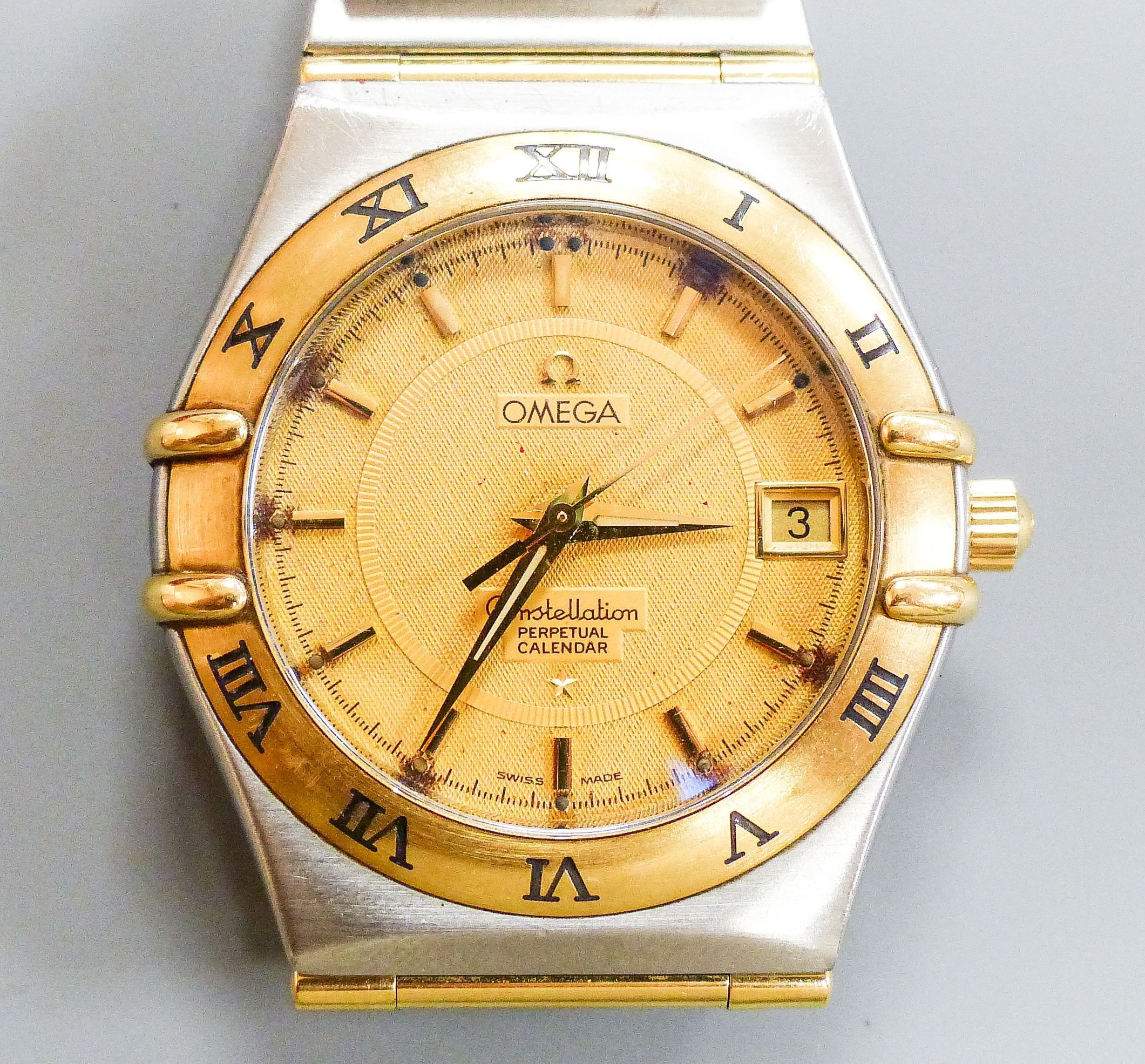 A gentleman's 1990's steel and gold Omega Constellation Perpetual Calendar wrist watch, with box and paperwork, movement 1680